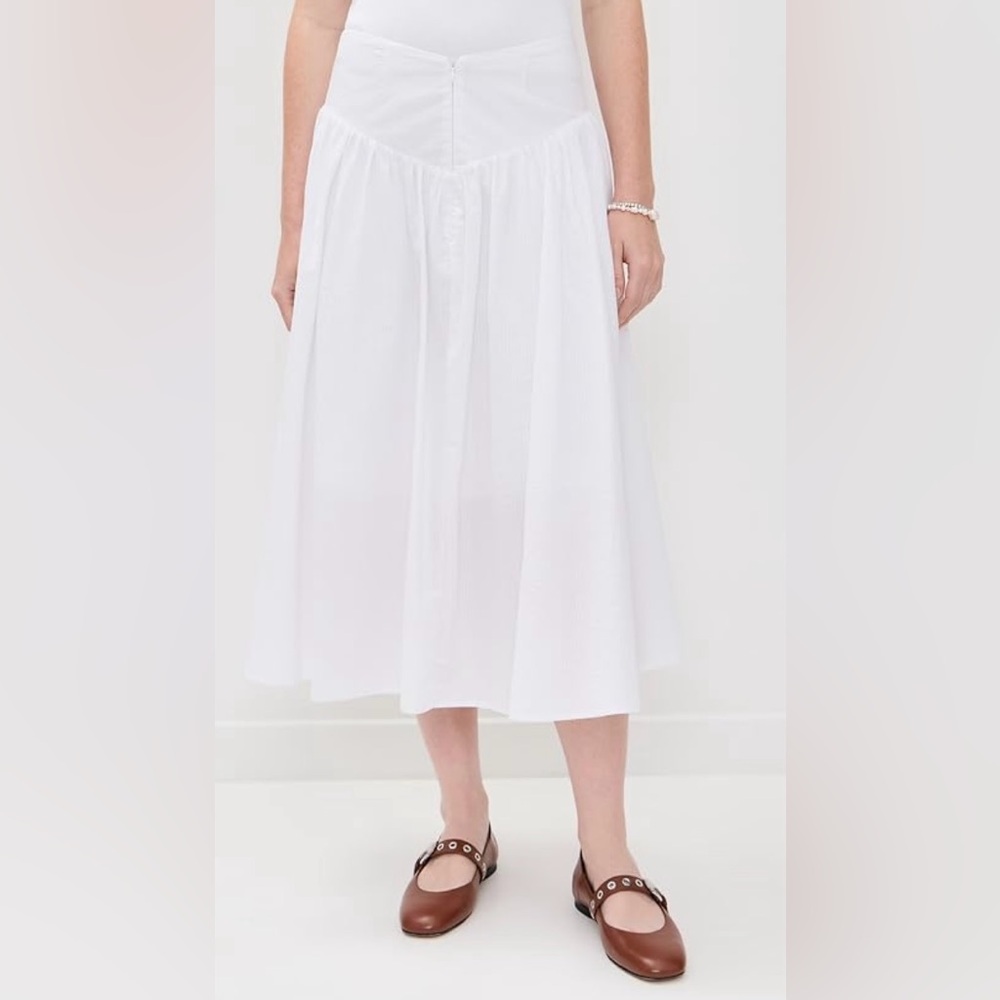 Deba Porcelain Midi Skirt
Peachy Den in Porcelain